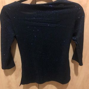 Glittery navy blue top.